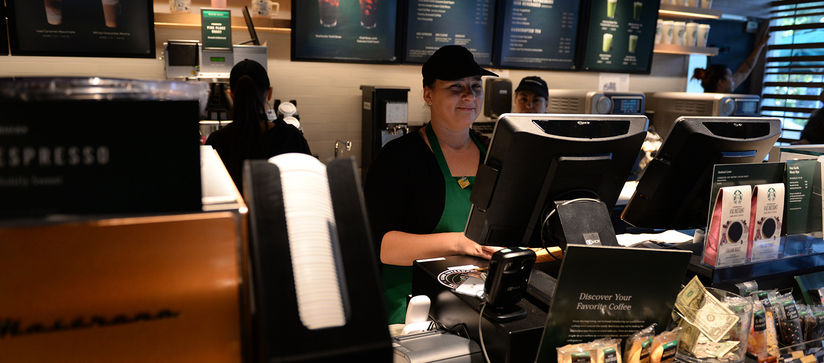 A welcoming barista on Starbucks