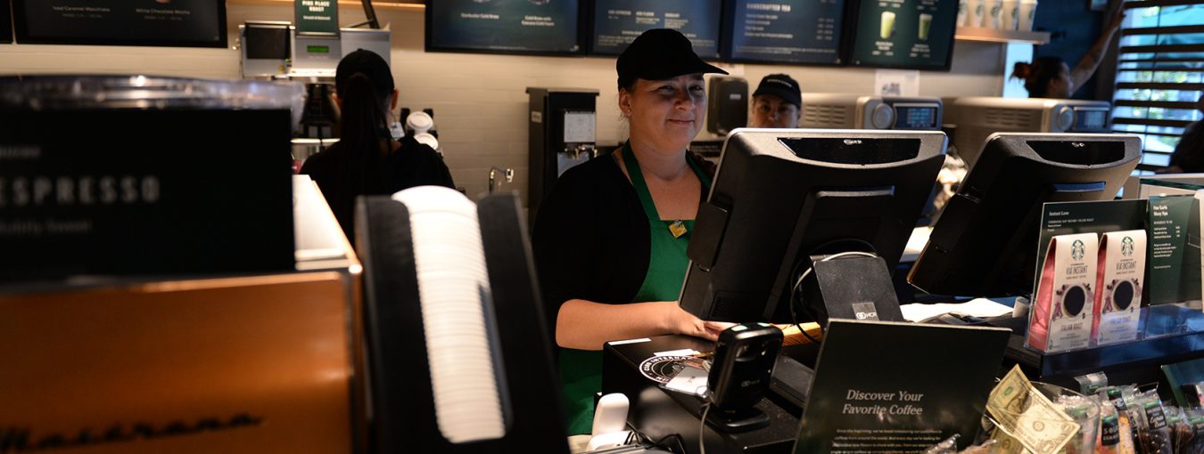 A welcoming barista on Starbucks