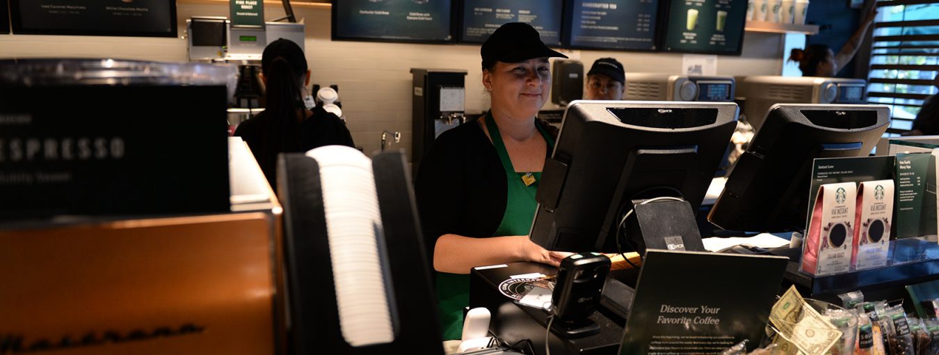 A welcoming barista on Starbucks